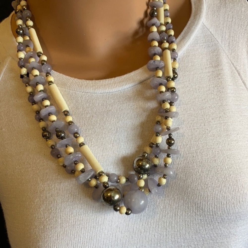 Vintage violet and bone color beaded triple strand necklace with silver tone